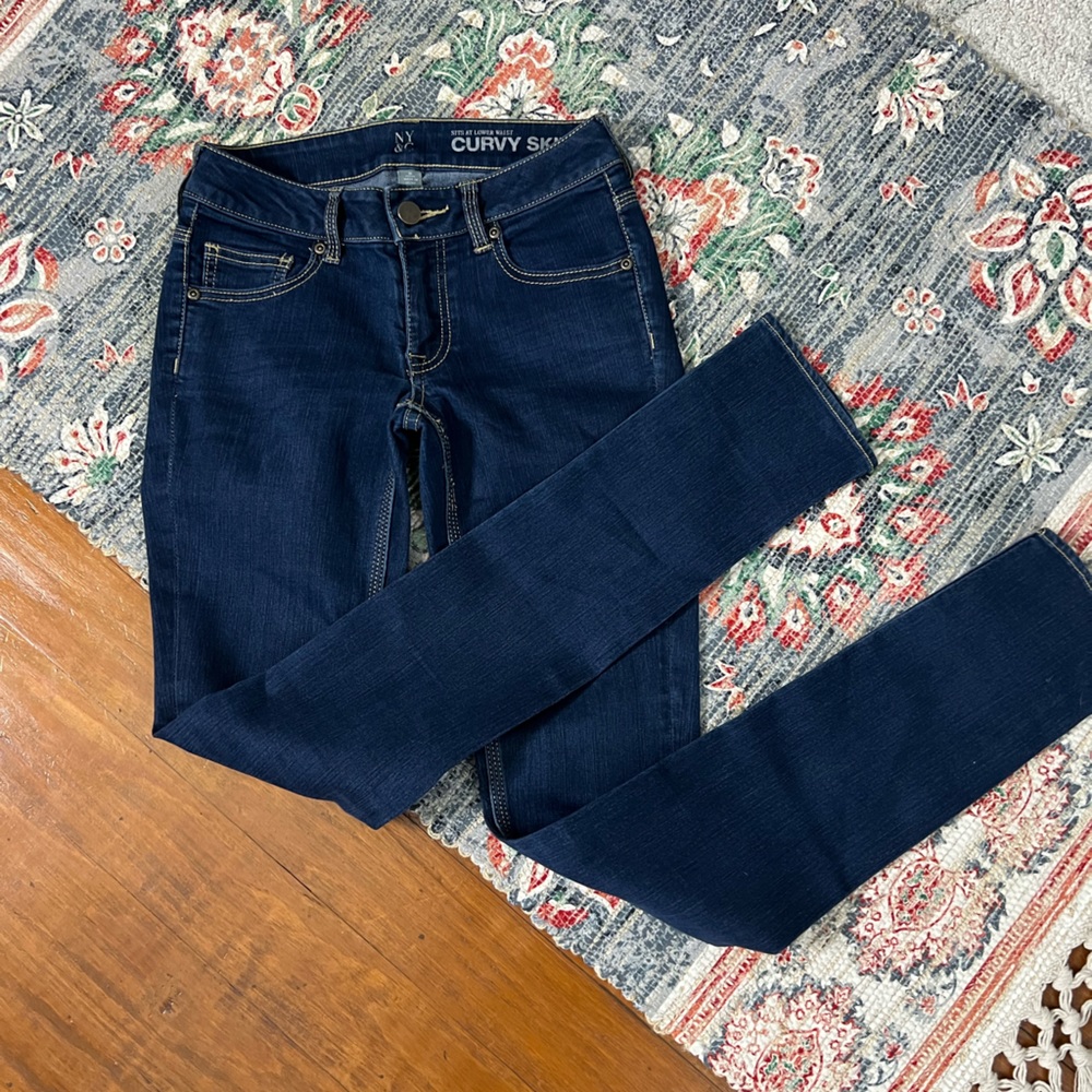 New York & Company sits at lower waist curvy skinny dark denim jeans